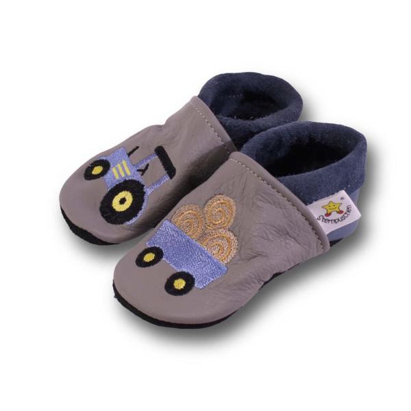 Krabbelschuhe blauer Trecker mit Anhänger